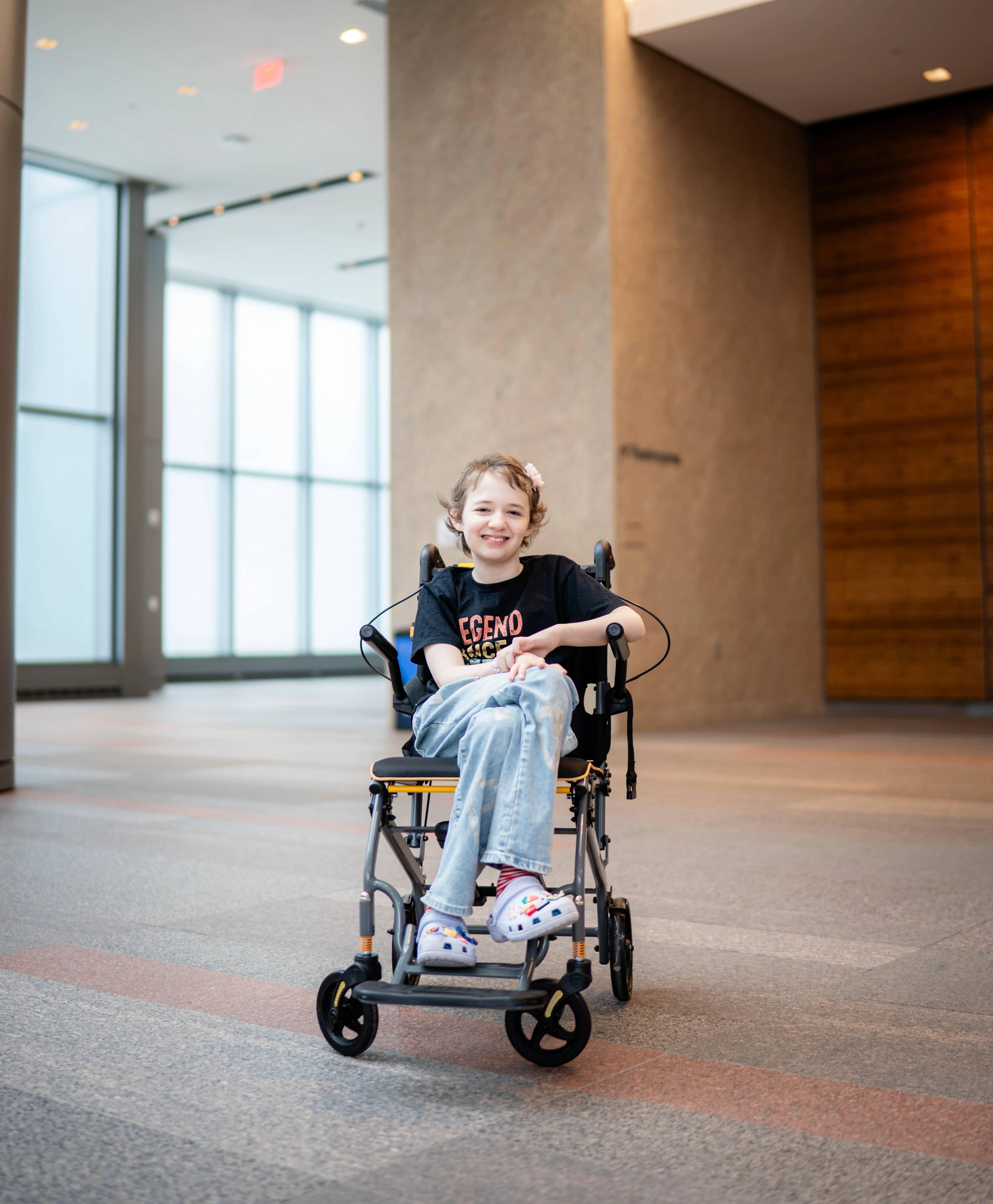 Eva posing in her wheelchair